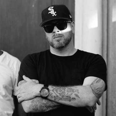 Apathy, born Chad Bromley on March 8, 1979, in Willimantic, Connecticut, is a celebrated underground rapper, producer, and a founding member of the hip-hop supergroup Demigodz. Known for his sharp lyricism and intricate wordplay, Apathy gained recognition through his solo projects and collaborations with artists like Celph Titled and R.A. the Rugged Man. His debut album, Eastern Philosophy (2006), cemented his status in underground hip-hop, followed by critically acclaimed projects like Honkey Kong (2011) and The Widow's Son (2018). As a versatile artist, Apathy blends classic boom-bap beats with raw, introspective storytelling, earning him a loyal fanbase and respect in the hip-hop community.